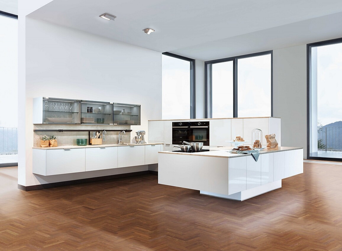 Das zeyko Fybridge Konzept verleiht der lichtgrauen Küche eine schwebende und sehr moderne Optik. Zuordnung: Stil Design-Küchen, Planungsart U-Form-Küche