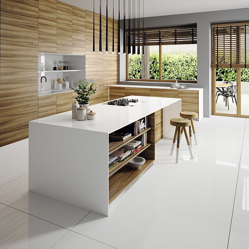 Diese moderne Inselküche mit hochglänzend weißer Silestone-Arbeitsplatte in „Iconic White“ bietet ausreichend Stauraum und ist mit einer Theke ausgestattet. Zuordnung: Stil Design-Küchen, Planungsart Küche mit Küchen-Insel