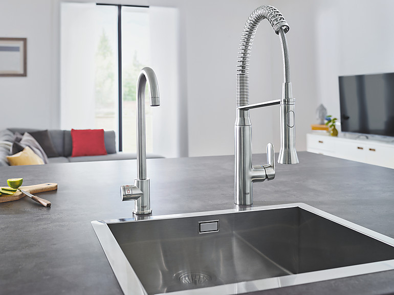 Die Kochenwasserarmatur Grohe Red Mono kann eine vorhandene Armatur sinnvoll ergänzen
